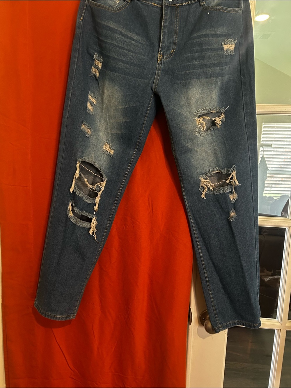 Distressed Women's Blue Denim Jeans